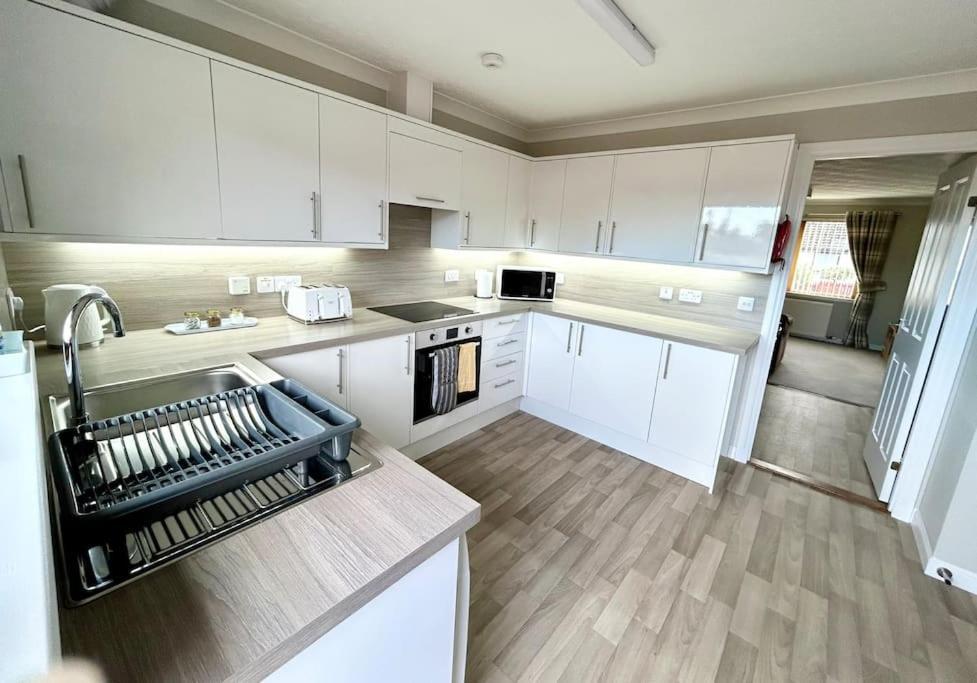 Cosy At Camden, Entire Bungalow Evanton ภายนอก รูปภาพ